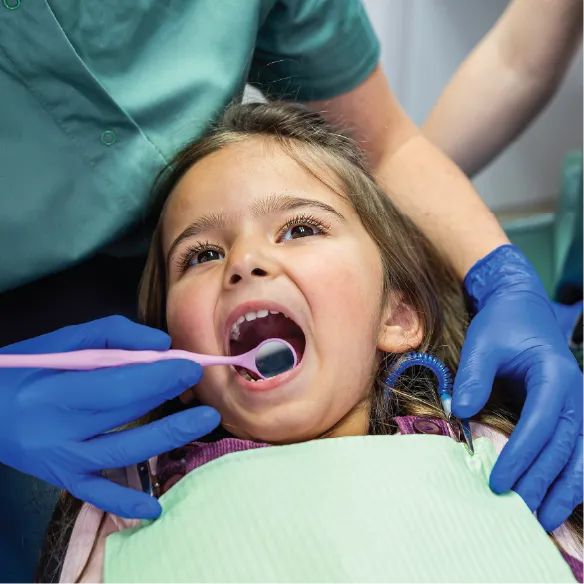 Child receiving a dental check-up